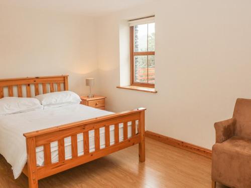 Voodi või voodid majutusasutuse Cahirkeen Cottage toas