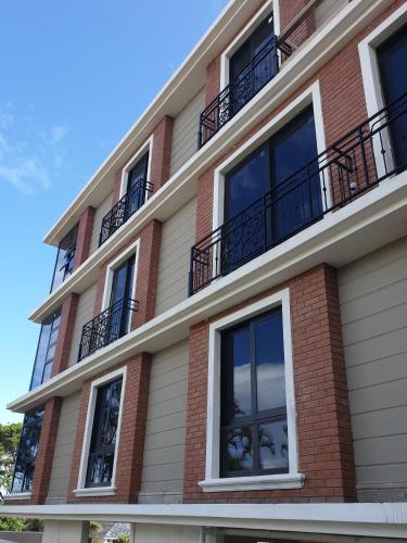 a building with windows and balconies on it at Andaluz Boutique Hotel in Durban