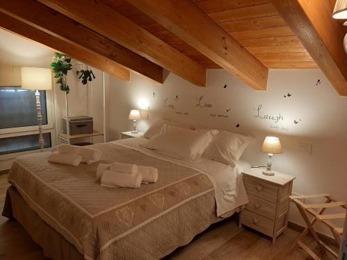 Agriturismo N'Uova Campagna tesisinde bir odada yatak veya yataklar