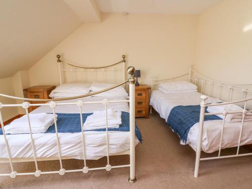 Ένα ή περισσότερα κρεβάτια σε δωμάτιο στο Glanyrafon