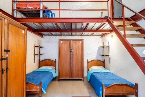 מיטה או מיטות בחדר ב-Granados Hostel