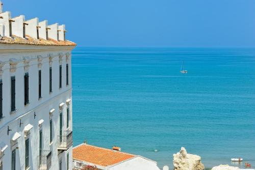 a view of the ocean from a building at Hotel Miramare in Rodi Garganico