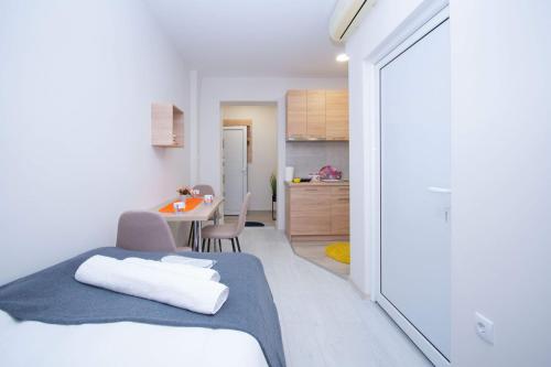 Cama o camas de una habitación en Cvetni trg