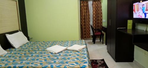 Una cama o camas en una habitación de Hotel Barbareek