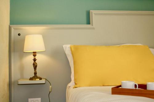 Postel nebo postele na pokoji v ubytování White Lilac Romantic B&B - Adults only
