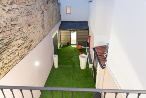 a room with a play area in a building at Casa Del Profumo in Piacenza