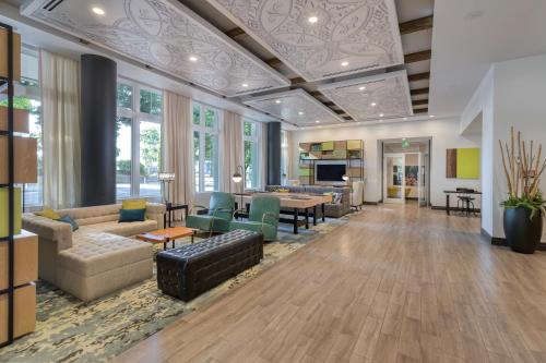 a lobby with couches and chairs and a table at WorldMark Portland Waterfront Park in Portland