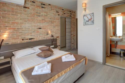 Postel nebo postele na pokoji v ubytování Eco complex Zdravets