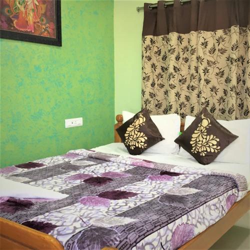Jayaram Residency Srikalahastiにあるベッド