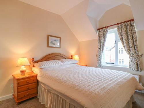 Llit o llits en una habitació de Lavender Cottage