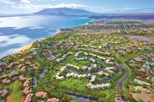 an aerial view of a resort next to the ocean at Palms at Wailea in Wailea