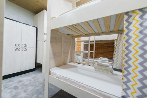 Кровать или кровати в номере My Hostel Almaty
