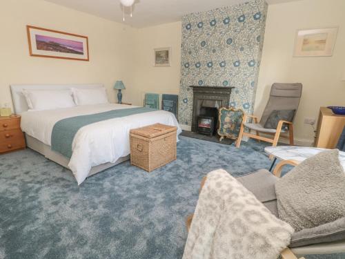 En eller flere senge i et værelse på Wordsworth Cottage West