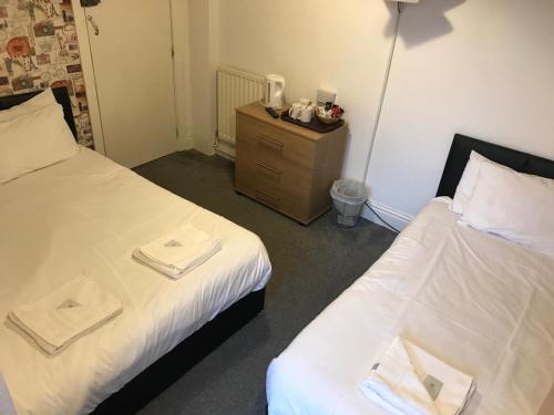 Ein Bett oder Betten in einem Zimmer der Unterkunft The Orbiston