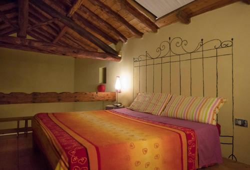 Postel nebo postele na pokoji v ubytování Casa Isotta