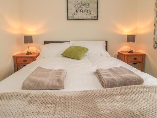 Ένα ή περισσότερα κρεβάτια σε δωμάτιο στο Chestnut Cottage