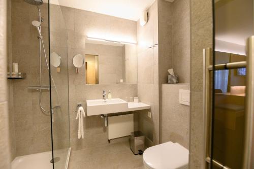 Ein Badezimmer in der Unterkunft Romantik Hotel & Restaurant Sternen