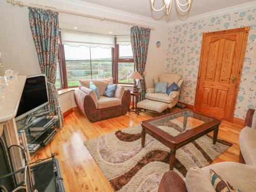 TV a/nebo společenská místnost v ubytování Starbay House