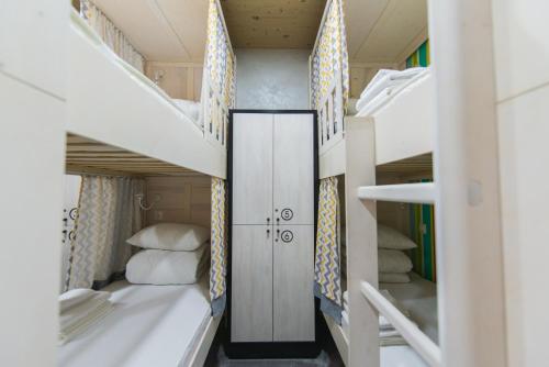 Кровать или кровати в номере My Hostel Almaty