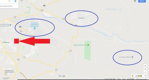 a map with a red arrow and circles at KIA - PESQUERIA - AEROPUERTO MONTERREY a in Monterrey