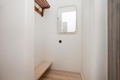 Ett badrum på Ascetic Skolas Street Apartment
