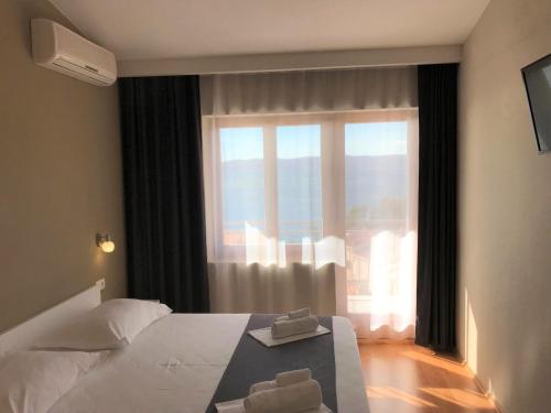 Postel nebo postele na pokoji v ubytování Berulia accommodation