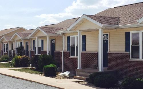 a row of houses on a street at Nauvoo Vacation Condos and Villas in Nauvoo