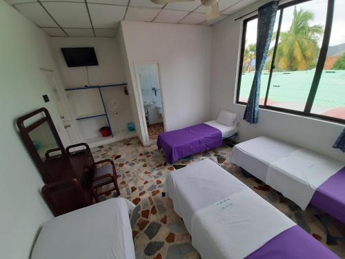 Hotel Sael 객실 침대