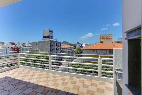 a balcony with a view of a city at Express Floripa Residence in Florianópolis