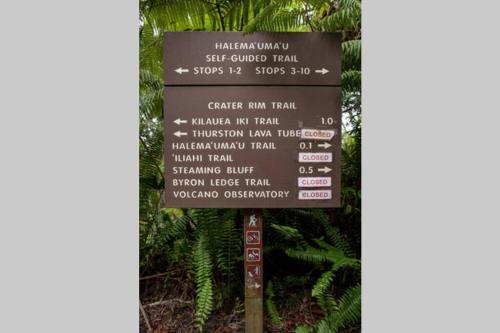 a sign at the start of the trail at Tutu's Place by Volcano Heritage Cottages in Volcano
