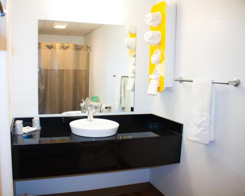 a bathroom with a sink and a mirror at Motel 6-Chilhowie, VA in Chilhowie