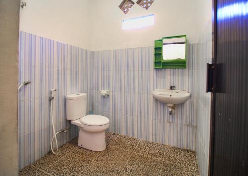 Un baño de Balengku Homestay