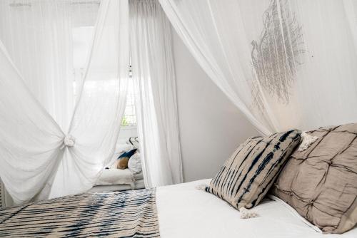 Posezení v ubytování Sandy Toes Cottage