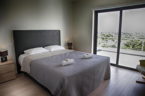 Кровать или кровати в номере Villa Celestine