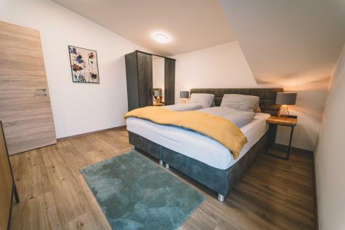 Ένα ή περισσότερα κρεβάτια σε δωμάτιο στο Mirador Apartments
