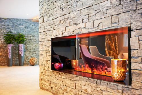 Fotografie z fotogalerie ubytování Wellness und Brunch Hotel MorgenZeit beheizter Naturpool mit Sandstrand Genuss Frühstück bis 13 Uhr Hochkönig Sommercard v destinaci Maria Alm am Steinernen Meer