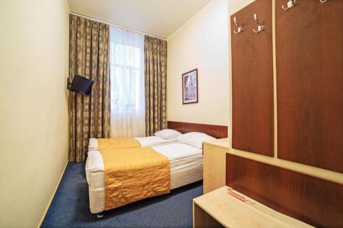 Cama o camas de una habitación en Hotel Vintage Sheremetyevo