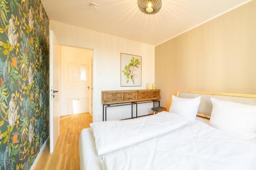 Кровать или кровати в номере Design Apartments - "Am Weinberg"
