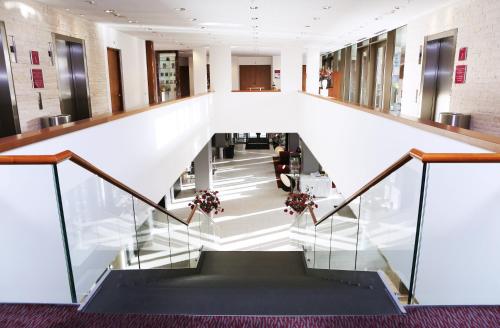 a view of a staircase in a building at Crowne Plaza Amsterdam - South by IHG in Amsterdam
