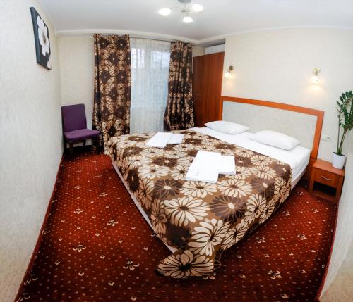 Postel nebo postele na pokoji v ubytování Apartments Deluxe
