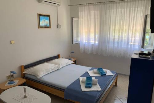 Posteľ alebo postele v izbe v ubytovaní Apartment 5 with pool and amazing sea view