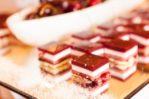 a pile of desserts sitting on top of a table at Giardino Marling in Merano