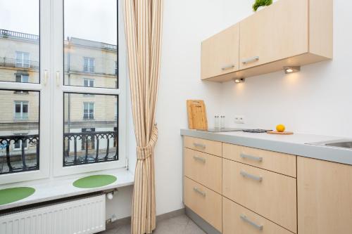 Kuchyň nebo kuchyňský kout v ubytování Apartments Warsaw Warecka by Noclegi Renters