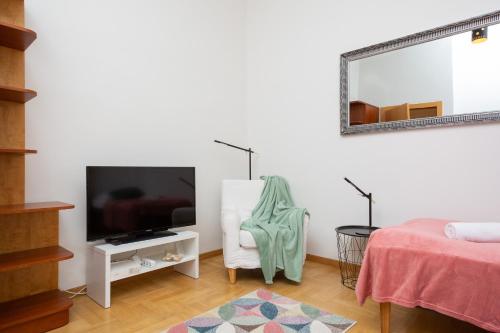 TV a/nebo společenská místnost v ubytování Apartments Warsaw Warecka by Noclegi Renters