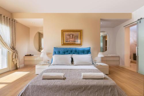 Posteľ alebo postele v izbe v ubytovaní Villa Ginevra by HMZ Villas