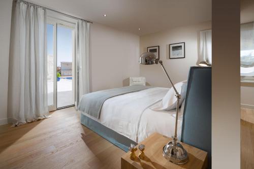 Posteľ alebo postele v izbe v ubytovaní Villa Melita by HMZ Villas