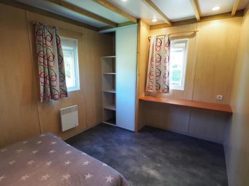 Postel nebo postele na pokoji v ubytování Camping Le Sorlut