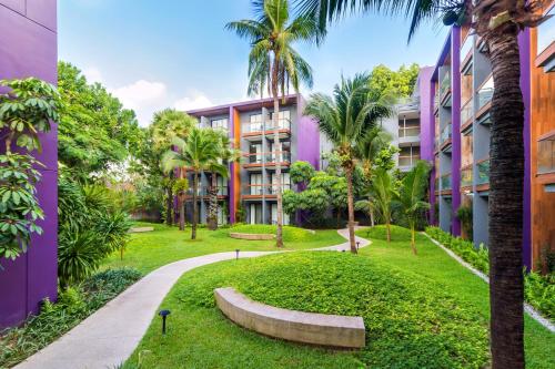 a view of the courtyard of a building at Holiday Inn Express Phuket Patong Beach Central by IHG in Patong Beach