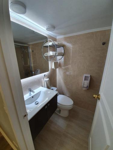 Ένα μπάνιο στο Isabel Suites Vitacura