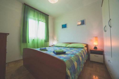Posteľ alebo postele v izbe v ubytovaní Family House Nino
